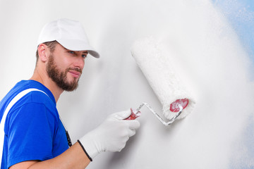 painter in white dungarees, blue t-shirt © guerrieroale