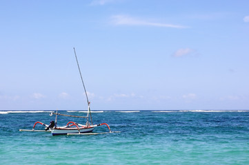 Fototapeta premium Traditional fishing boat in the blue sea