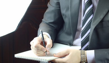 hand writing notes journalist