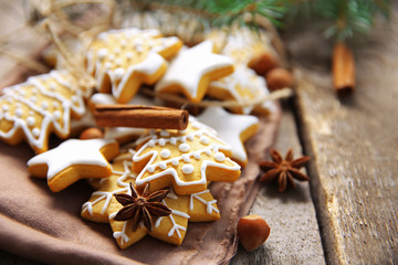 Cookies with spices and Christmas decor, on wooden table - Powered by Adobe