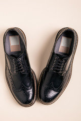 pair of man brogues shoes