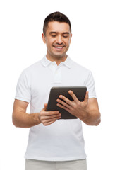 smiling man with tablet pc computer