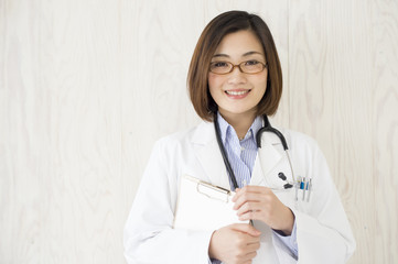 Woman doctor has a medical record