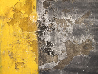 grunge yellow and black concrete wall texture