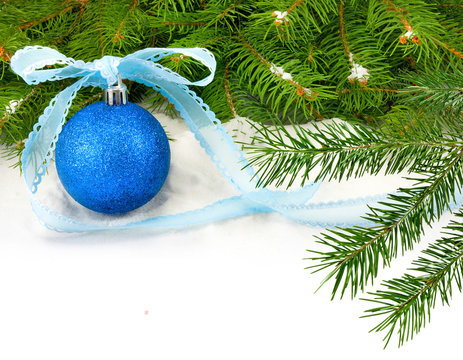 image of blue Christmas ball on a blue background close-up