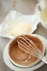 Cooking chocolate cream on kitchen