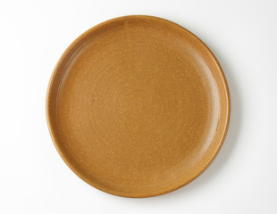 Round brown dinner plate