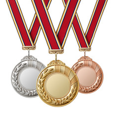 Set of gold, silver and bronze medals with  ribbons isolated on white background.