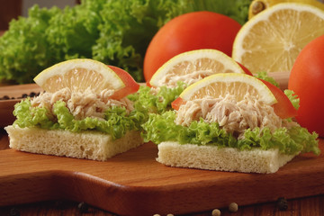 Tuna sandwich on chopping board
