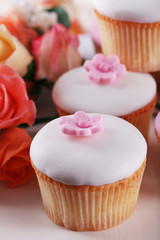 Tasty cupcake on stand, close-up