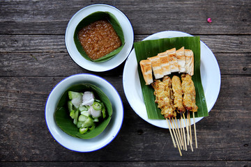 Satay on wood background