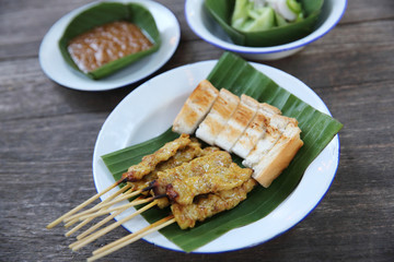 Satay on wood background
