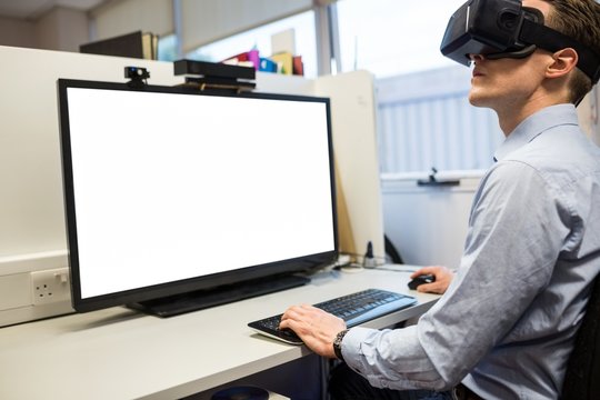 Businessman using oculus rift headset