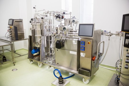 Large vat with taps and pumps