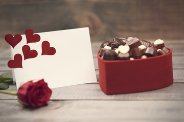 Box full of black and white chocolates.