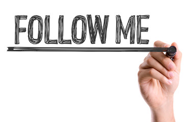 Hand with marker writing: Get More Followers