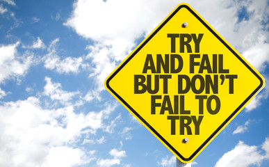 Try and Fail But Don't Fail to Try sign with sky background