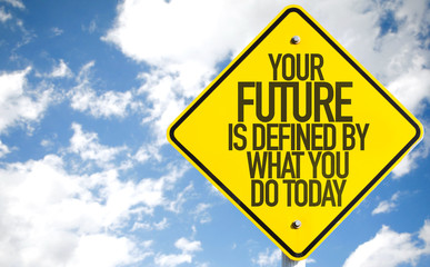 Your Future is Defined By What You Do Today sign with sky background