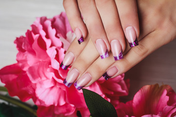 French nail art in purple colour
