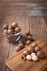 Macadamia with  wooden background