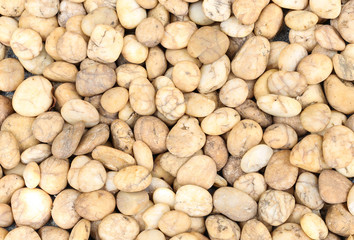 Small brown natural garden rock pebbles background