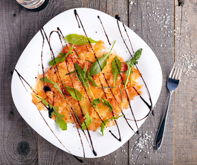 Top view of salmon carpaccio