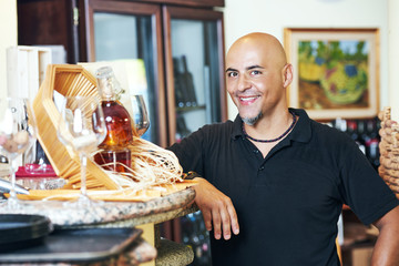 Sommelier barman with glass of water 