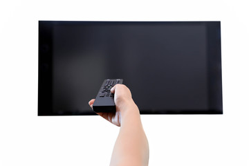 Hand holding remote control to the TV screen isolated