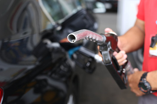 Man holding petrol pump