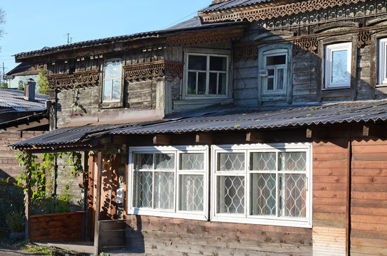 Old wooden house with carving in the city of Irkutsk