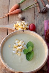 Corn soup of delicious and fresh corn .
