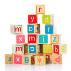 wooden toy cubes with letters. Wooden alphabet blocks.