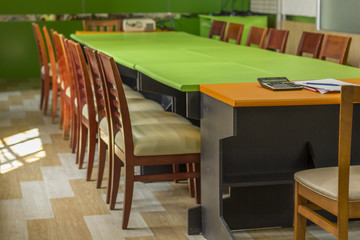Wooden chairs in Empty business conference room interior.
