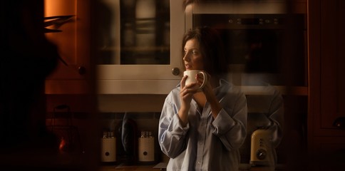 Young woman holding mug