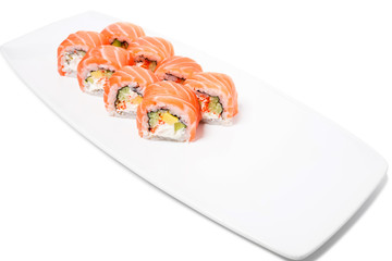 Uramaki salmon roll with avocado.