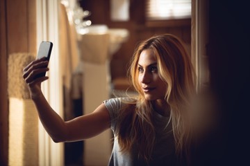 Pretty woman taking selfie 