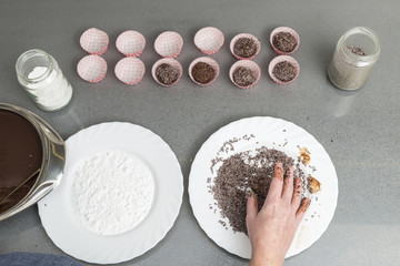 Woman preparing chocolate truffles