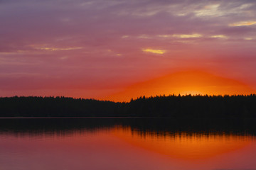Fototapeta na wymiar Sunset at lake.