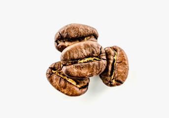 Close up roasted coffee beans isolated on white background