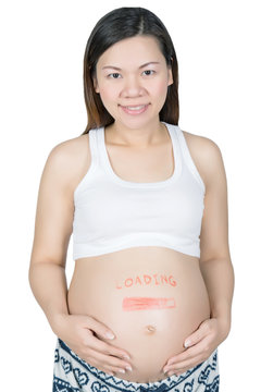 Pregnant woman with loading concept painted on her belly