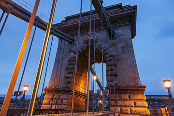 Fototapeta na wymiar Chain bridge during the sunrise