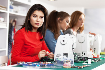 Fototapeta premium Women in a sewing workshop