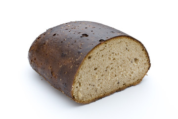 Dark rue bread on a white background.