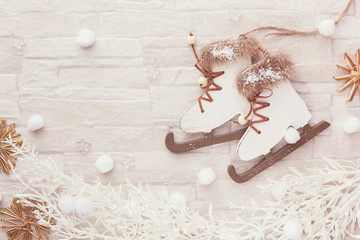 Christmas winter background.Figure skate Christmas ornament on festive background