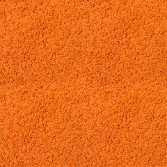 Seamless orange fitted carpet texture.