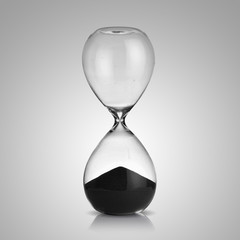 hourglass on gray background