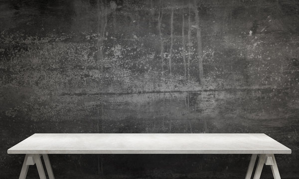 Modern White Table With Legs And Free Space. Black Wall Texture In Background.