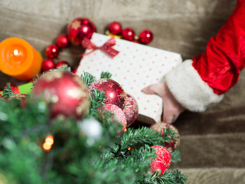 holidays, celebration and people concept - close up of santa cla