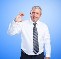 mature man showing something