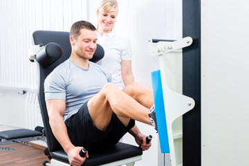 Physiotherapist exercising patient in sport therapy